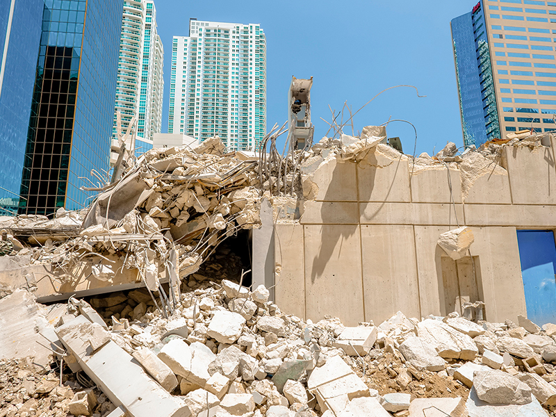 Crumbled Building on a construction site in the middle of a cityscape